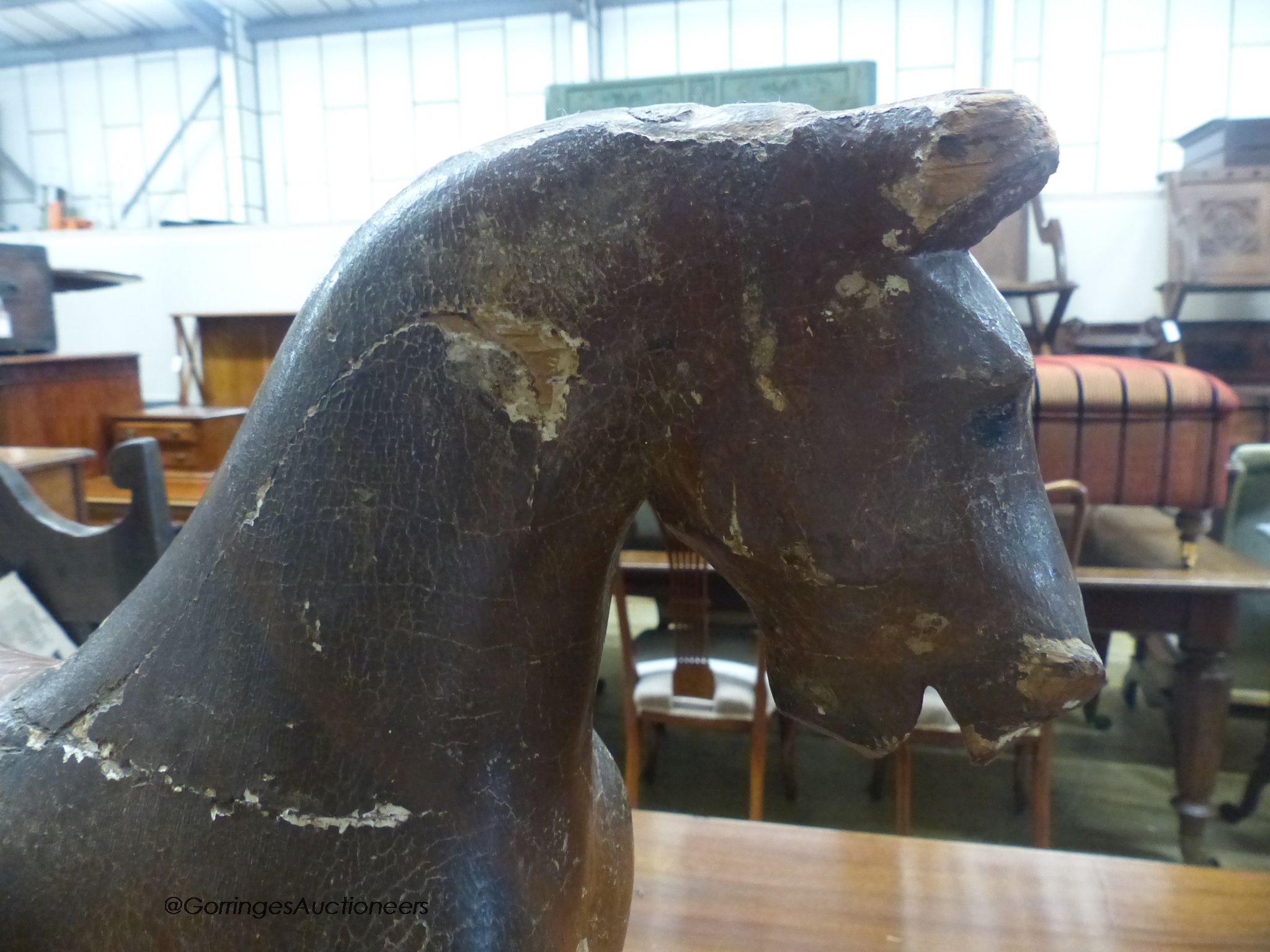 A Victorian painted push along toy horse, width 60cm